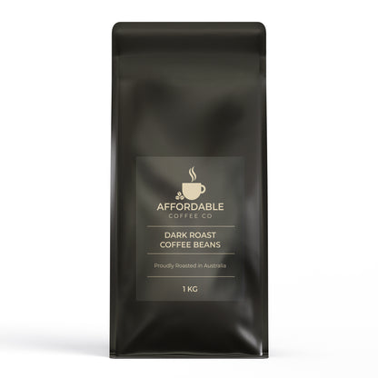 Black plastic bag of Affordable Coffee Co Dark Roast Coffee Beans 1 kg on a white background.